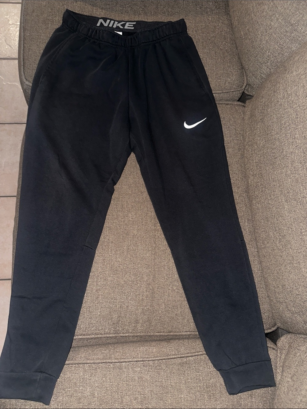 Nike Black Jogger Sweatpants with White Swoosh Logo